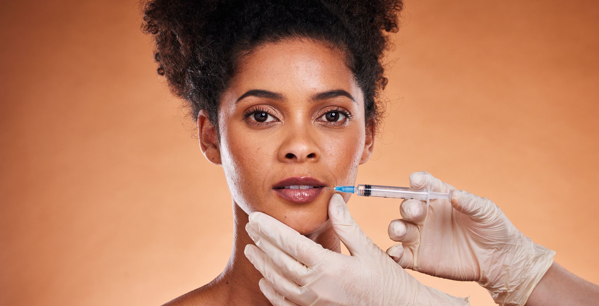 Botox injection procedure at clinic, Dermal fillers applied to enhance facial volume, Before and after Botox or dermal filler treatment, Close-up of facial rejuvenation with dermal fillers, Cosmetic treatment with Botox for wrinkle reduction, Patient receiving Botox or dermal filler injections, Minimally invasive anti-aging facial treatment, Smooth skin after Botox or dermal filler application, Clinician performing dermal filler procedure, Natural-looking results from Botox and fillers,